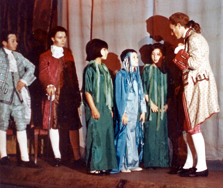 Select this image to see a larger version. Mr. Sneer (Neil Saunders) and Mr. Dangle (Gordon Cochran) watch as Mr. Puff (Martin Wallace instructs The River Thames (Clive Saunders) and his two Banks (Julie Micharel and Linda McMahon) for their performance in the Pageant.
