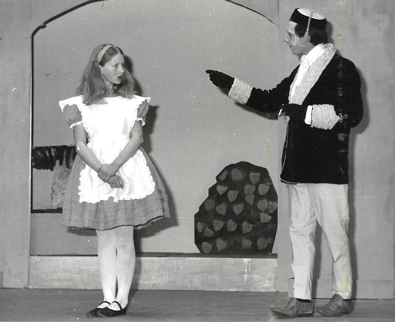 Select this image to see a larger version. Margaret Tweedy as Alice and Ian R. Wallace as the Blue Caterpillar