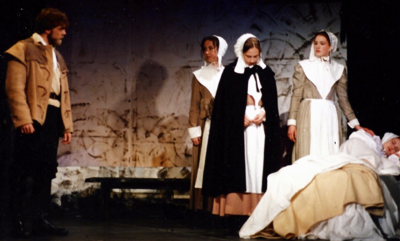 Select this image to see a larger version. Act One: Proctor (David Worley) with (from L to R) Mercy Lewis (Caitlin Hughes), Mary Warren (Helen Wallace), Abigail Williams (Catherine Lambert) and Betty Parris (Katie Gourd)