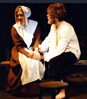Elizabeth Proctor (Carla Quelch) and her husband John Proctor (David Worley) say their farewells. Select this image to see a larger version. 