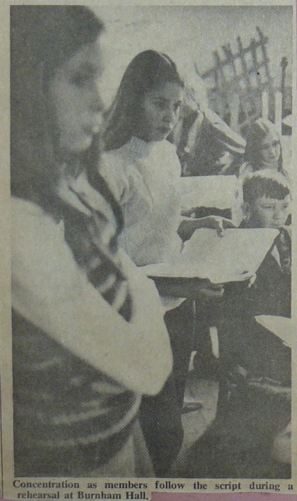 Select this image to see a larger version. Concentration as members follow the script during a rehearsal at Burnham Hall. - MID-WEEK FREE PRESS, Dec. 1, 1971.