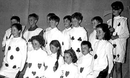 Select this image to see a larger version. The Pack of Cards - with a young Andrew Kitchen (later to be Group Director) at the back - far right - clutching his axe!
