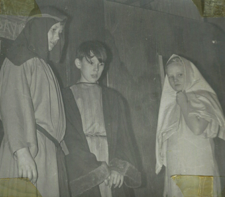 Select this image to see a larger version. (L to R) Jacob Issacs, the Innkeeper (Ian Worsfold) Joseph (Stephen Burwood) and Mary (Julia Packer)