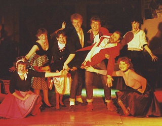 Mr Popovitch (Philip Sheahan) is given a 'lift' by the younger members of the cast in 'I Remember Rock' Select this image to see a larger version. 