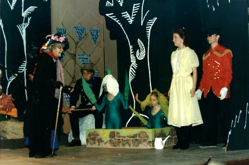 Select this image to see a larger version. Urdr (Aviva Wiseman - left) with Gerda (Clare Garnet - second right) in the Enchanted Garden with (from right to left) Wooden Soldier (Graham Wilkinson), Tiger Lily (Angharad Rhys-Williams), Snowdrop (Tania Baker) and Gar the Garden Gnome (Matthew Humberstone).