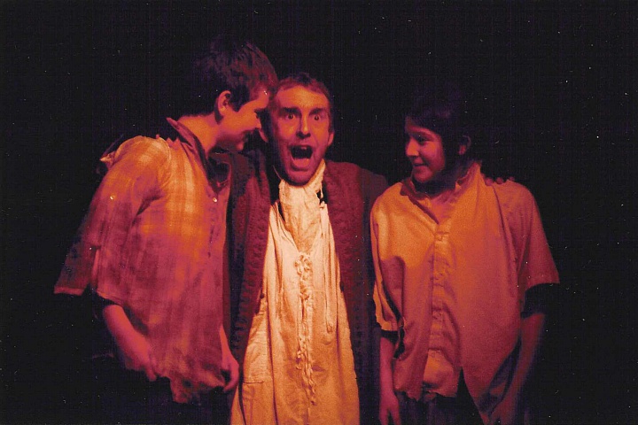 Select this image to see a larger version. Scrooge (Ryan Witney) with the two Urchins (Sean Wilson and Chloe Mantripp)