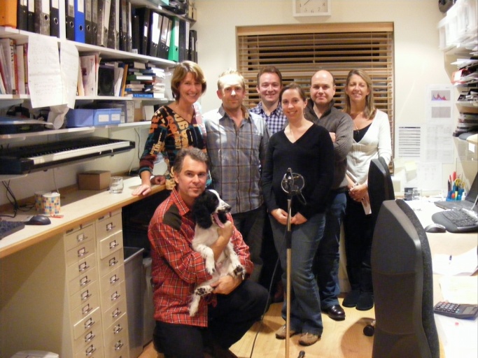 Select this image to see a larger version. Extra Sound Recording (new songs) for “mr Scrooge”,  November 2007.
Clare White (née Murrell), Ryan Witney (Scrooge), Richard Peters (MD),Helen Chaldecott (née Wallace), Paul Bacon, Janine Britton, and
(in front kneeling with dog) Mark Britton.		(Photo: Ian R. Wallace)